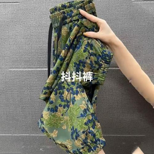 大码墨绿色印花休闲裤女2025年夏季新款抖抖裤百搭弹力九分哈伦裤